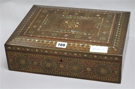 A Damascus style brass and abalone inlaid box 36 x 11cm